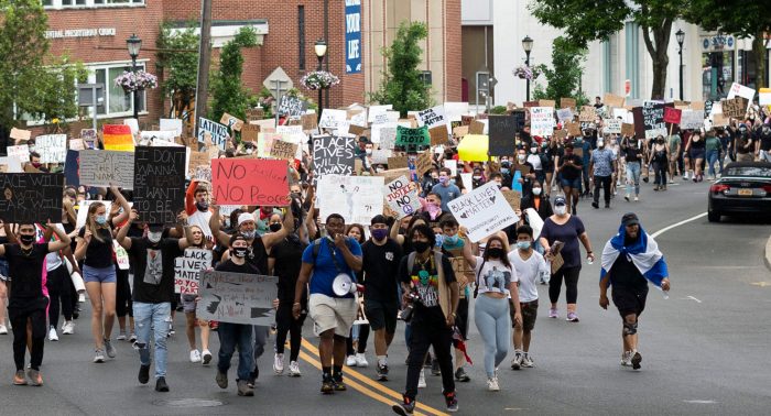 The march leaves downtown Huntington as it makes its way toward Heckscher Park 1 e1591642816534