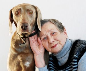 senior woman and dog