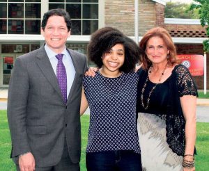 From left: Syosset High School Principal Dr. Giovanni Durante and Syosset Superintendent of Schools Dr. Thomas Rogers congratulate National Merit Scholarship winner William Long along with Assistant Principal Christopher Ruffini.