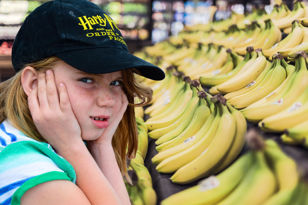 girl covers ears picture