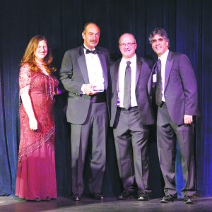 Sharon Maier-Kennelly, Honoree Bruce Migatz, Adam Grundfast and Suresh Sani at last year's Spotlight Gala