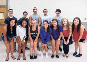 The lead characters of All Shook Up with director Sam Morales (bottom left) and producer Pragna Krishnamurthy (bottom row, second from left). 