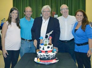 Michael Koblenz and board members, Brian Meyerson and Deputy Mayor Manny Zuckerman, join event co-chairs Donna Liebowitz and Kelly Spier for the ceremonial cutting of the cake. 