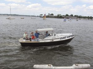 Fleet Captain Pete Hults and family, led last year’s fleet by the town dock to be blessed.