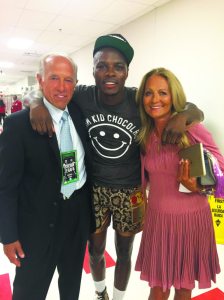 Dr. Joseph Osipow and his wife flank Peter Quillin, AKA Kid Chocolate.