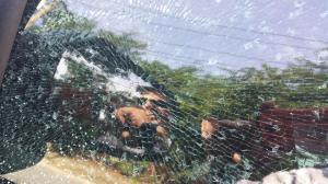 A shattered car window on Jamaica Avenue 