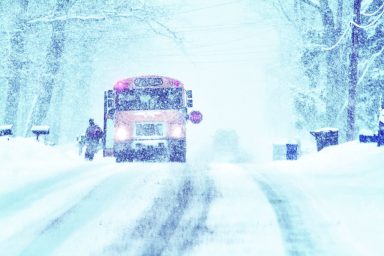 Child Student Running to School Bus in Blizzard Snow Storm