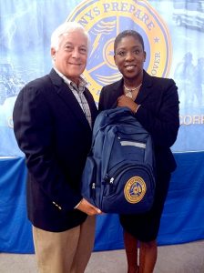 New York State Assemblyman Charles Lavine and Nassau County Legislator Siela A. Bynoe hold up a “Go Kit” which was filled with emergency supplies and given out at the event.