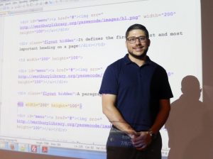 Matthew Kates teaches the coding class for teens at the library.