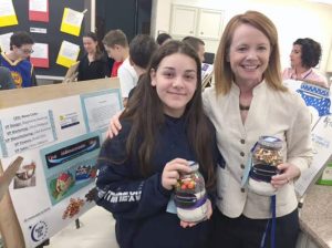 Mattlin Middle School principal Beth Torreano (right) joins student Stephanie Axelrod at the Gourmet Cookie Mix Sales Bazaar. 