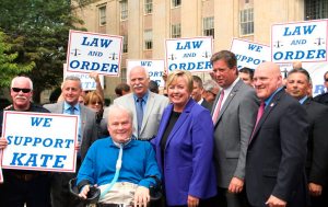 Police union members with Brian Hoesl, president of Superior Officers Association (standing behind Police Officer Steven McDonald), Supervisor Kate Murray, candidate for Nassau County DA, Glenn Ciccone, president of Nassau County Police Department Detectives Association and James Carver, president of Nassau PBA. 