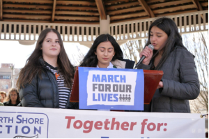 EnoughMarchB Great Neck Middle School Students Hannah Sutin Sabrina Namigohar and Joanne Sarfati recited the names of the slain Parkland students