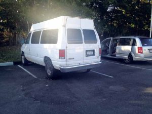 Santiago was able to stop this white van, which had a man trapped underneath it.