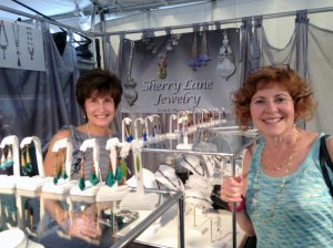 Roslyn resident Stacey Rothschild, left, with Sherry Lane, a vendor at the exhibit (Photo by Cynthia Paulis)  