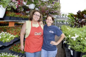 Westbury resident Cathy Sclafani, an associate, and Maria Festa, owner. 