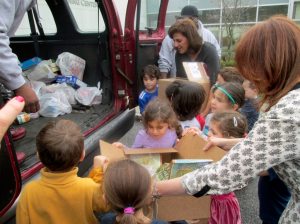 A teacher assists the students 