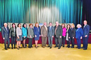 State and school officials discuss education (from left): Board of Education Trustees Donald Ashkenase and Susan Healy; United Parent-Teacher Council (UPTC) Moderators Hui Liu and Rebecca Sassouni; Great Neck Teachers Association President Sheila Henchy; Superintendent Dr. Teresa Prendergast; Regent Roger Tilles; State Senators Jack Martins and Carl Marcellino; UPTC Copresidents Sarah Moss and Joanne Chan; State Assemblywoman Michelle Schimel; Board of Education President Barbara Berkowitz; and Board of Education Vice President Lawrence Gross. (Photo by Jeff Barlowe)