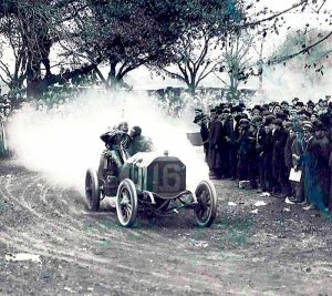 The Vanderbilt Cup Races storm through the Westbury turn at the corner of Jericho Turnpike and Elliston Road in Westbury. 