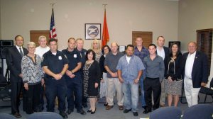 It was a time for giving heroes their due at the last Manorhaven Board of Trustees meeting. Mal Nathan, Max Fleming, Bill Purcell, Thomas Lampus, Jose Mauricio Soriano, Kevin Nicoll, Kevin Watt and Michael Weidner were honored for their efforts to prevent even more loss of life and property damage when a boat in Manhasset Bay caught flames after filling up at Manhasset Bay Marina, killing the boat’s owner. The heroes are flanked on far right by Guy LaMotta, the marina’s owner, Manorhaven Mayor Giovanna Giunta (c.) and Mayor Barbara Donahue to her right, along with village trustees and village attorney James Toner.