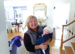 Merrie Hines with one of her four grandchildren