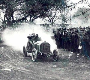 George Robertson in the Old 16 Locomobile storming through the Westbury Turn at the corner of Jericho Turnpike and Elliston Road in Westbury. Robertson would become the first driver to win a Vanderbilt Cup Race in an American car in 1908. 