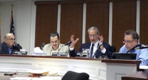 At the Hookah Lounge trial before the Old Village board of trustees, board members consider the issues. Pictured (l-r): trustees Norman Namdar and Jeff Bass; Mayor Ralph Kreitzman and Deputy Mayor Mitchell Beckerman.