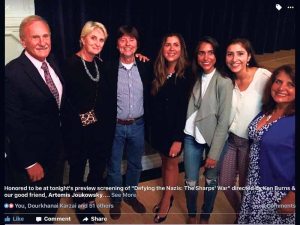 Colin and Latifa Woodhouse received the Sharp Rescue Award in New York City for their humanitarian efforts in Lesbos, Greece. From left: Colin Woodhouse; Mariana Goldman, the voice of Martha Sharp in the film; film director Ken Burns; Jessica, Sophia, Alexandra and Latifa Woodhouse