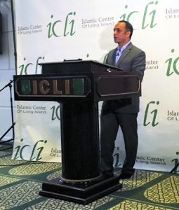 Rais Bhuiyan speaks to a crowd at the Islamic Center of Long Island. 