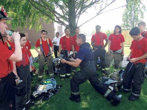 Junior Firefighters learn proper technique and safety. 