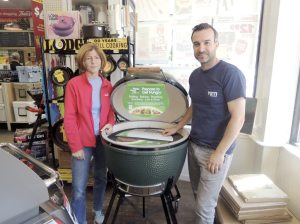 Alper’s Sheryl Alper Cohen and Adam Novick with the Big Green Egg