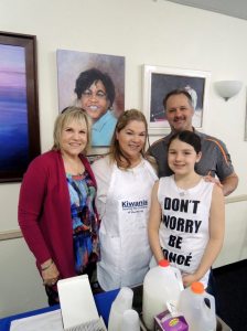 Esther Miller with Valentina and Michael Hartman with their daughter.