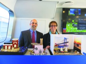 Principal Ronald Gimondo and Assistant Principal Kathleen Murray of John F. Kennedy Elementary School display the projects their students’ created to bring awareness to the Lighthouse.