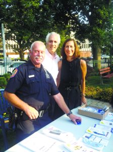 From left: A member of the Nassau County Police Department, Village of Great Neck Justice Mark Birnbaum and Nassau County Legislator Ellen W. Birnbaum at a past National Night Out