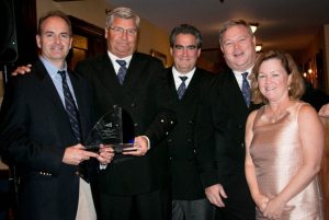 George Catallo, PWYC, won the Edward I. duMoulin Memorial Trophy for his contribution to the advancement of Junior Sailing. From left: George Catallo, PWYC Commodore Ken Weigand, Vice Commodore Howard Curd, Rear Commodore Michael J. Lyons and Maureen Catallo. 