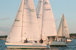 Sailors enjoying Manhasset Bay on an evening race last year that took them out to Long Island Sound and back