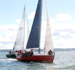 Bob Schwartz, Manhasset Bay YC member and skipper of Nordlys is seen here on the Manhasset Bay YC Fall Series Race Course with Carl Olsson, Morning Glory, Larchmont YC. (Photo by Doug Stebbins)