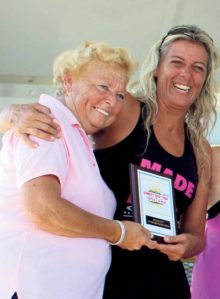 Women’s Athena Masters champion Bernadette Winnubst of Bayville is congratulated by Nassau County  Legislator Rose Walker.