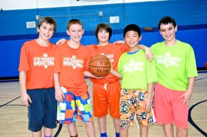 Participants in PYA’s basketball program