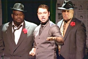 Robert Gallo, as Nicely-Nicely Johnson, and cast sing “Sit Down, You’re Rockin’ the Boat.” (Photos by Brian E. Long)