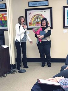 Nina Melzer thanks Janet Rutkowski for her service. (Photo by Victoria Onorato)