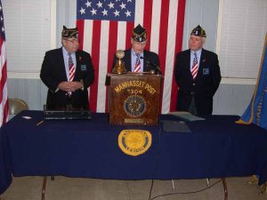 Matthew Falcone, retiring commander; Richard Miller, past commander, nominating chairman; Peter Killian, post commander