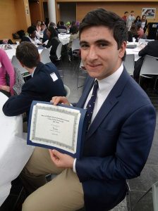 Peter Charalambous, online editor-in-chief for Chaminade High School, with his paper’s third place award for Best Online Publication