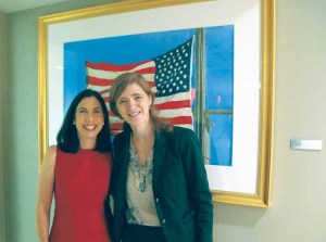 Barbara Ernst Prey (left) with United States Ambassador to the United Nations Samantha Power in front of her painting Gallantly Streaming.