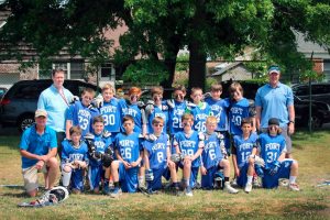 Coaches McCarvill, Lowe and Cassidy with the PYA boys lacrosse 11 year old team