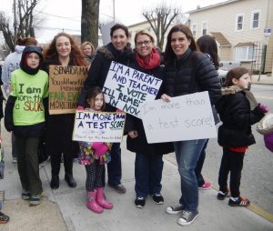 Parents rallied outside Sen. Martins' office in Mineola 