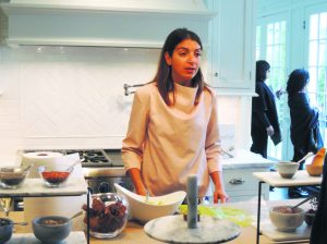 Mary Giuliani putting together tasty treats with fun toppings