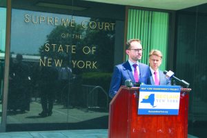 Reclaim New York’s executive director Brandon Muir with attorney Dennis J. Saffran