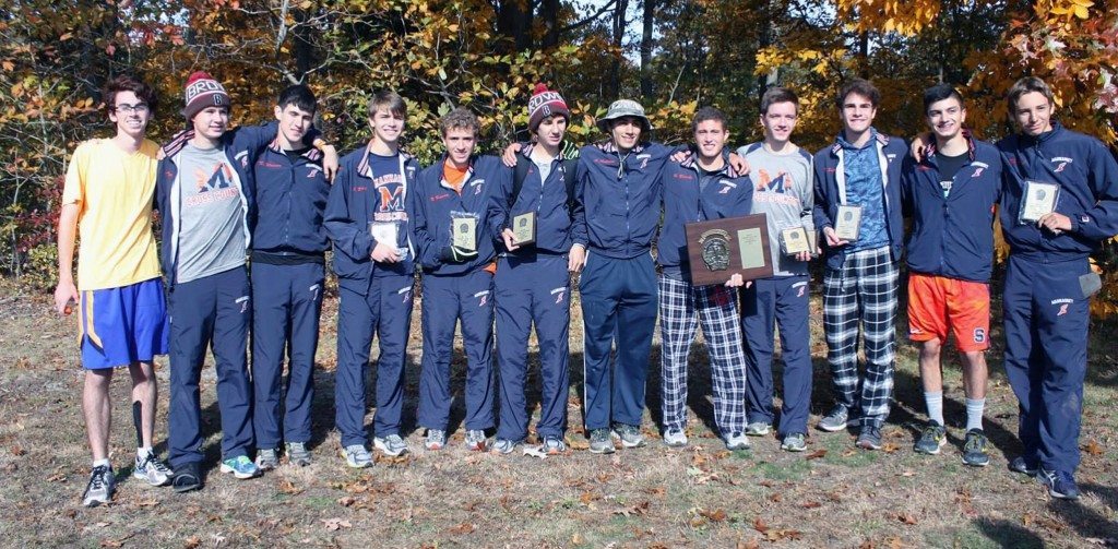 Manhasset’s Varsity XC Team stands proud after taking home the Section VIII Class II team title. Pictured from left: Joe Meyer, Ryan Thorpe, Ryan Watson, Justin Blanche, Nicky Harris, Aidan Caggiano, Athan Anderson, Harrison Barsky, Tim Courts, Daniel Petruso, John Cyprus and Milton Pirsos.