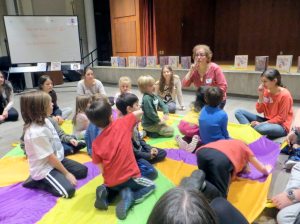 Elise May teaching students