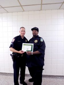 Officer Jonathan Cutrone and Security guard Tony Hollie